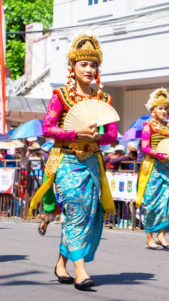 stock image Gandrung dance from Mataram on 3rd BEN Carnival. This dance symbolizes the local people's joy and hope, giving the guests a warm welcome.