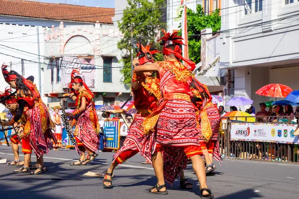 stock image Cakalele dance from Maluku on the 3rd BEN Carnival. Cakalele is a traditional Maluku war dance which is used to welcome guests or in traditional celebrations.