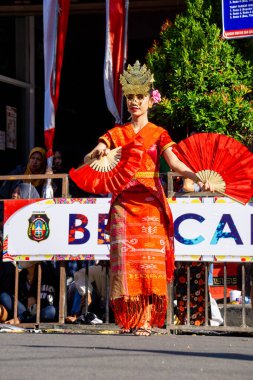 Endeng-endeng dance from North Sumatera on the 3rd BEN Carnival. This dance functions as an entertainment dance, and as a means to express joy in social interaction clipart