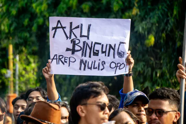 stock image Students demonstrate by carrying signs that mean they reject dynasty politics and changes to the election law.