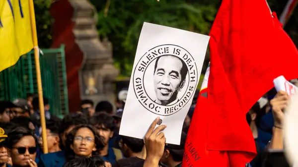 stock image Students demonstrate by carrying signs that mean they reject dynasty politics and changes to the election law.