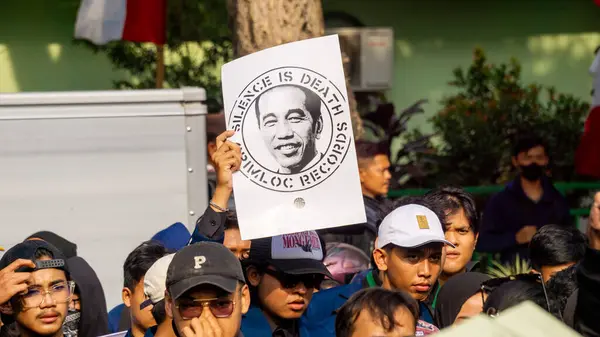 stock image Students demonstrate by carrying signs that mean they reject dynasty politics and changes to the election law.