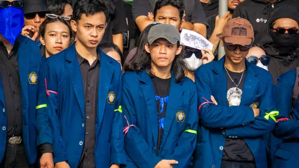 stock image Students demonstrate by carrying signs that mean they reject dynasty politics and changes to the election law.