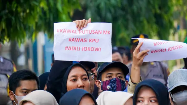 stock image Students demonstrate by carrying signs that mean they reject dynasty politics and changes to the election law.