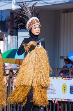 Salawaku dance from West Papua on the 3rd BEN Carnival. This dance is performed by dozens of male and female dancers. clipart