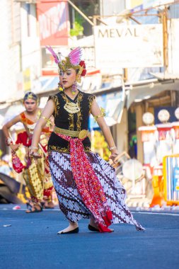 Golek ayun-ayun dance from Central Kalimantan on the 3rd BEN Carnival. This dance is performed to welcome guests and is usually danced by 2 dancers up to 6 dancers clipart