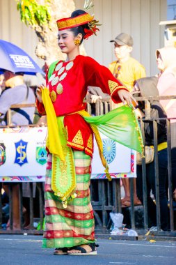 Lariangi dance from Southeast Sulawesi on the 3rd BEN Carnival. In the past, this dance was a dance offering to entertain the king. clipart