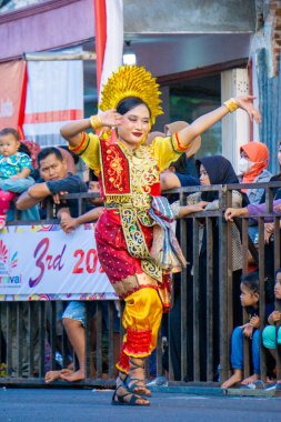 Lipa sabbe dance from South Sulawesi on the 3rd BEN Carnival. Lipa Sabbe dance is used in traditional wedding ceremonies clipart