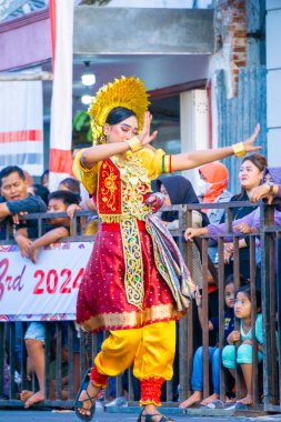 Lipa sabbe dance from South Sulawesi on the 3rd BEN Carnival. Lipa Sabbe dance is used in traditional wedding ceremonies clipart