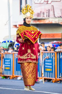 Sekapur Sirih dance from Jambi on the 3rd BEN Carnival. This dance is one of the traditional dances to welcome guests. clipart