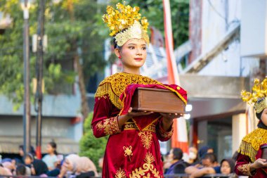 Sekapur Sirih dance from Jambi on the 3rd BEN Carnival. This dance is one of the traditional dances to welcome guests. clipart