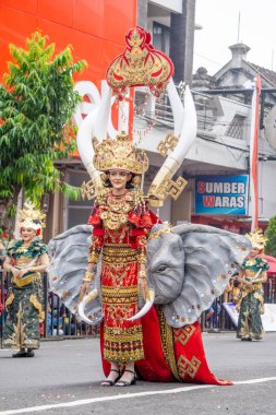 Woman with beautiful elephant costume at BEN Carnival. The costume looks luxurious.