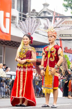 Indonesian with a traditional dress from west borneo (kalimantan barat) at BEN Carnival