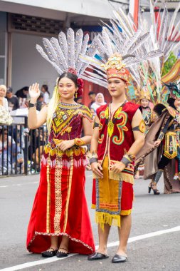 Indonesian with a traditional dress from west borneo (kalimantan barat) at BEN Carnival