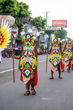 Kinyah mandau dance from Central Borneo. This dance depicts the heroic spirit and the willingness of Dayak warriors to defend the honor of their ancestral land.