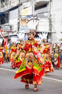 Kinyah mandau dance from Central Borneo. This dance depicts the heroic spirit and the willingness of Dayak warriors to defend the honor of their ancestral land.