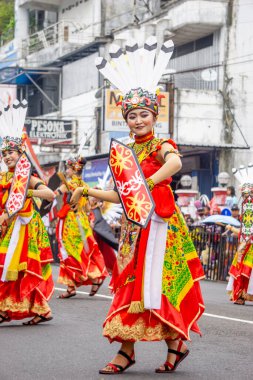 Kinyah mandau dance from Central Borneo. This dance depicts the heroic spirit and the willingness of Dayak warriors to defend the honor of their ancestral land.