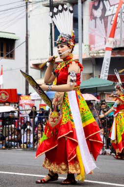 Kinyah mandau dance from Central Borneo. This dance depicts the heroic spirit and the willingness of Dayak warriors to defend the honor of their ancestral land.