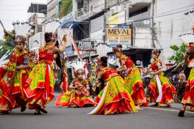 Kinyah mandau dance from Central Borneo. This dance depicts the heroic spirit and the willingness of Dayak warriors to defend the honor of their ancestral land.