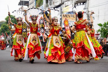 Kinyah mandau dance from Central Borneo. This dance depicts the heroic spirit and the willingness of Dayak warriors to defend the honor of their ancestral land.