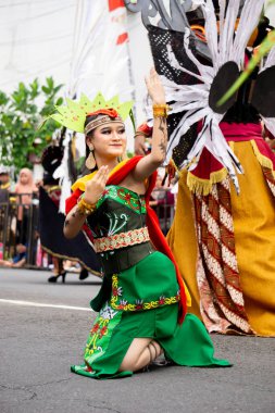 Balean dadas dance from Central Borneo. This dance was previously used to ask God for healing for sick people and now it is used to welcome guests.