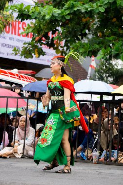 Balean dadas dance from Central Borneo. This dance was previously used to ask God for healing for sick people and now it is used to welcome guests.