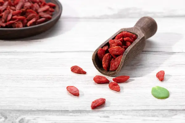 Dried Goji Berries Wooden Spoon Wooden Plate White Background Stock Photo