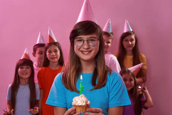 Smiling Caucasian Girl Wearing Glasses Holding Birthday Cupcake Candle Background —  Fotos de Stock