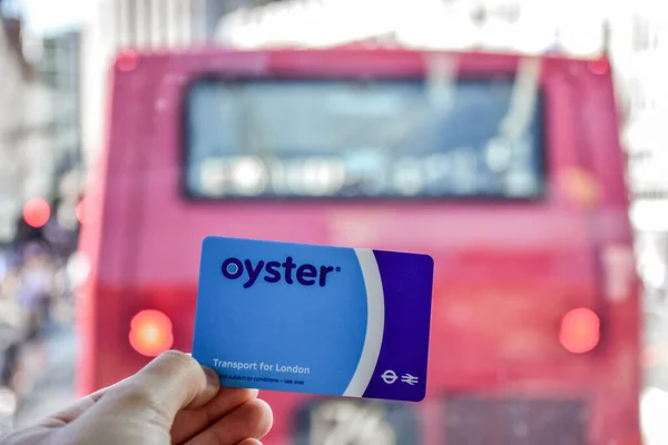 stock image London, England - July 07 2017: Oyster card and red doubledecker in London