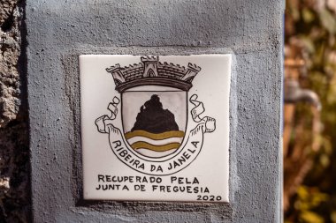Tall lava rocks in ocean, islet towers in Ribeira da Janela, Madeira, Portugal