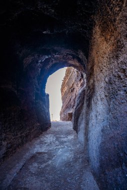 Tall lava rocks in ocean, islet towers in Ribeira da Janela, Madeira, Portugal