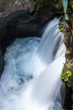 Waterfalls in Klammsee near Kaprun in Salzbur, Austria. The Klammsee is one of the reservoirs for the power plant in Kaprun.