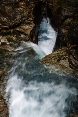 Waterfalls in Klammsee near Kaprun in Salzbur, Austria. The Klammsee is one of the reservoirs for the power plant in Kaprun.