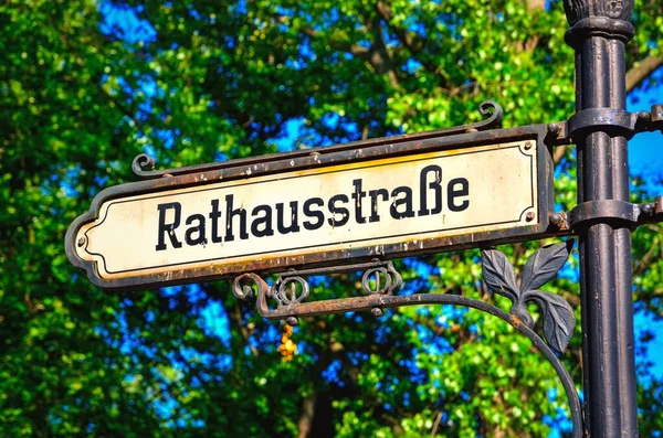 stock image Berlin, Germany - May 3, 2014: Old-fashioned signpost at Rathausstrasse with tree at the background in Berlin, Germany.