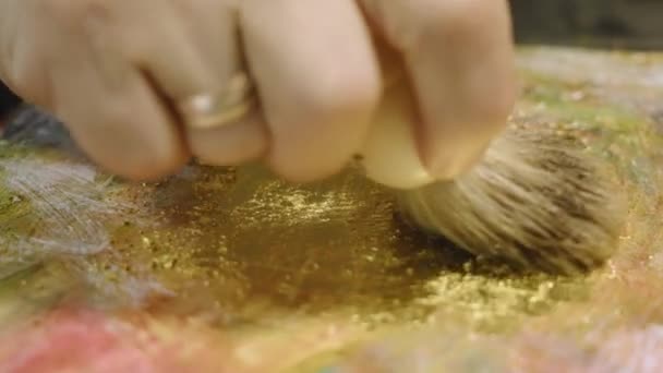 Artist Applies Gold Oil Painting Canvas — Stock Video
