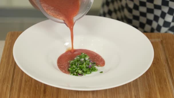 Chef Pouring Freshly Prepared Vegetable Gazpacho Soup Plate — Stock Video