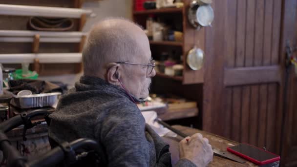 Senior Gray Haired Male Master Wheelchair Working His Workshop Sharpening — Video Stock