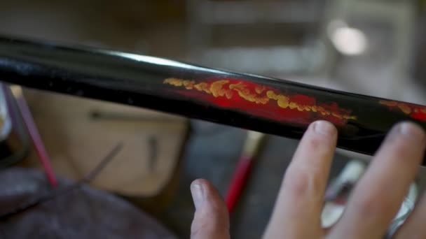 Elderly Male Master Works His Workshop Restoring Japanese Sword Sheath — Stockvideo