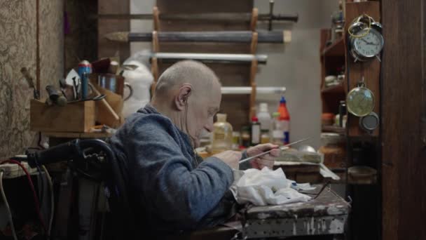 Senior Gray Haired Male Master Wheelchair Working His Workshop Sharpening — Vídeo de Stock
