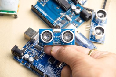 mainboard top view writing a set of instructions or a computer program in code form