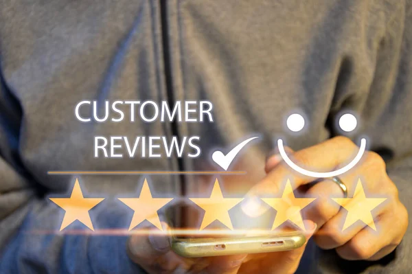Customers rate service of Businessmen choose to rate 5 stars using smart phone and give five star symbol. Excellent rating. User give rating, feedback, good business network score