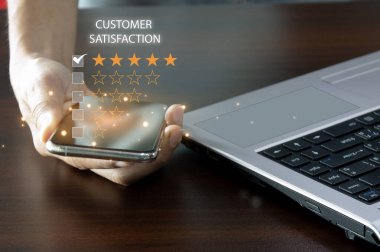 Users rate service experience on online application for customer satisfaction survey concept.	