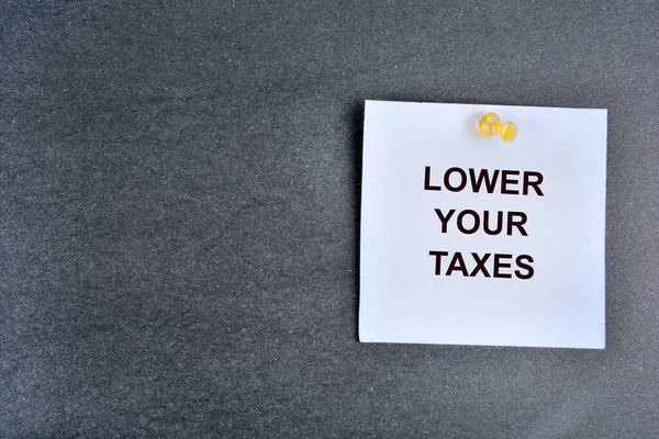 Lower Your Taxes Words Note Paper — Stock Photo, Image