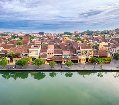 Aerial drone view of Hoi An city, Vietnam. Ancient town, UNESCO world heritage, at Quang Nam province. One of the most popular touristic destinations clipart