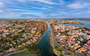 Aerial drone view of Hoi An city, Vietnam. Ancient town, UNESCO world heritage, at Quang Nam province. One of the most popular touristic destinations clipart