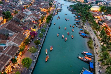 Aerial drone view of Hoi An city, Vietnam. Ancient town, UNESCO world heritage, at Quang Nam province. One of the most popular touristic destinations clipart