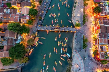 Aerial drone view of Hoi An city, Vietnam. Ancient town, UNESCO world heritage, at Quang Nam province. One of the most popular touristic destinations clipart