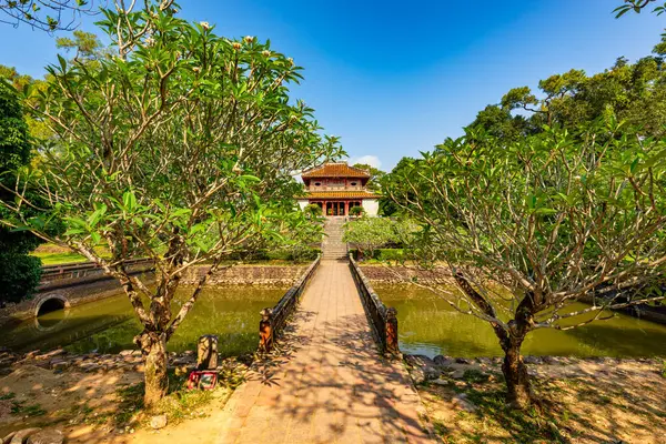 stock image Minh Mang tomb near the Imperial City with the Purple Forbidden City within the Citadel in Hue, Vietnam. Imperial Royal Palace of Nguyen dynasty in Hue. Hue is a popular