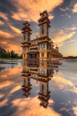 The Tay Ninh Holy See, also known as the Great Divine Temple or the Cao Dai Temple. It serves as the central house of worship for Caodaism, a religion founded in the early 20th century. clipart