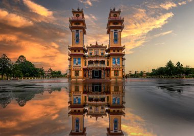 The Tay Ninh Holy See, also known as the Great Divine Temple or the Cao Dai Temple. It serves as the central house of worship for Caodaism, a religion founded in the early 20th century. clipart